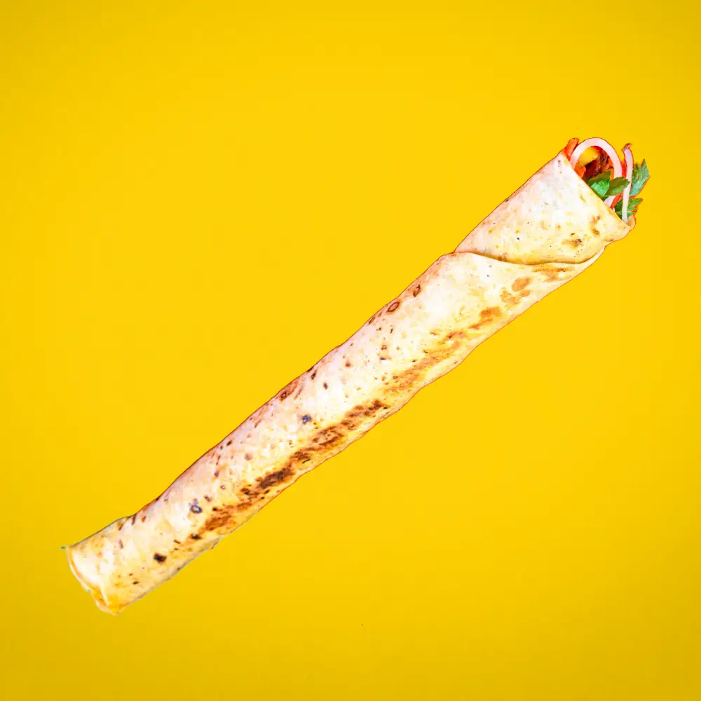 MiaBurrito'nun uzun ve doyurucu Zurna Döner'i, Fethiye'de servis edilen tavuk döner dürüm.