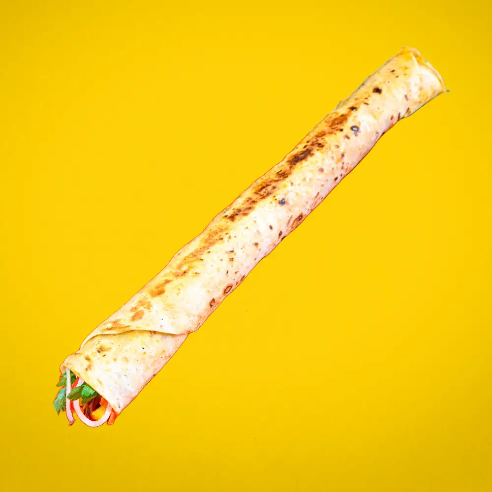 MiaBurrito'nun bol kaşarlı ve uzun Zurna Döner'i, Fethiye'de servis ediliyor.